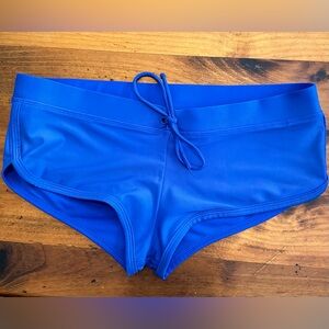 Body glove bikini bottom. Short shorts style. Size Medium. Royal blue color